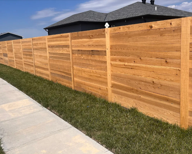 Modern horizontal cedar wood fence with clean lines - Monroe, NC